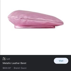 A simple beret in a soft metallic leather with a printed lining